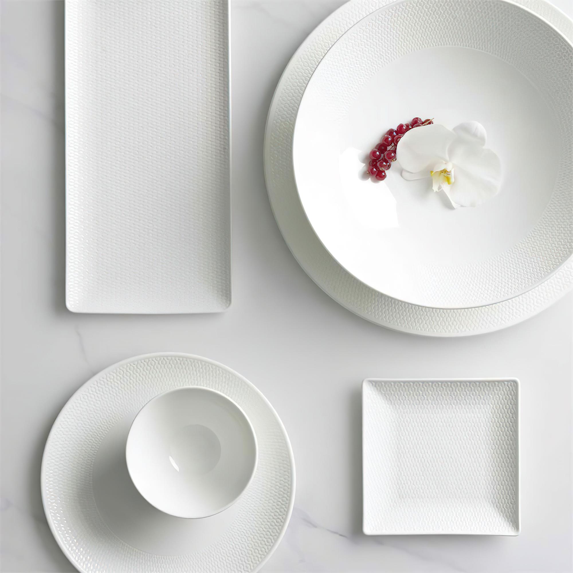 table setting with minimalist dishes